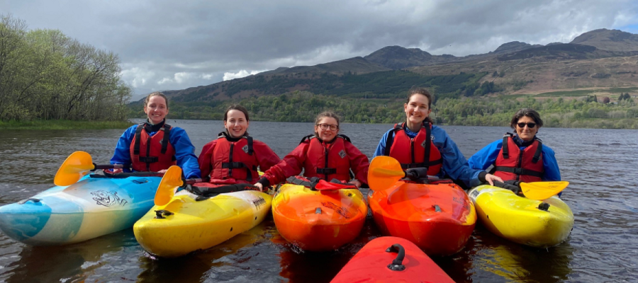 group of students kayaking together