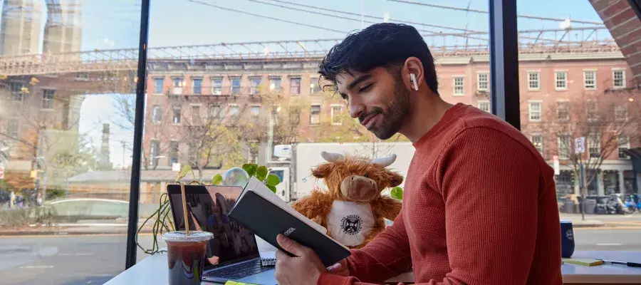 man working on laptop in New York