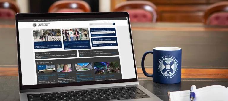 laptop with Edinburgh University website open and cup