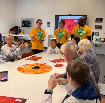 Members of the public learning about retinal images at the Eye Eye doctor Edinburgh Science Festival Event