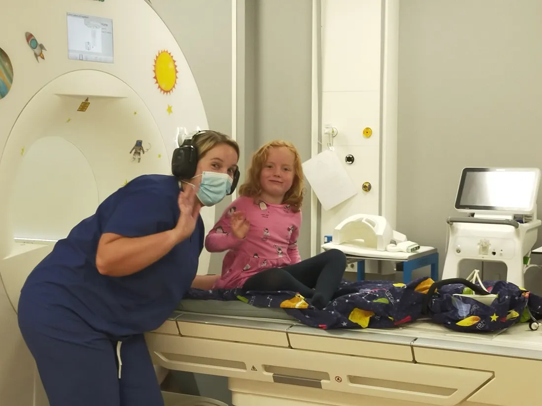 Edinburgh Imaging Research Radiographer Isla Mitchell (left), with study participant (right), at the EIF RIE MR scanner